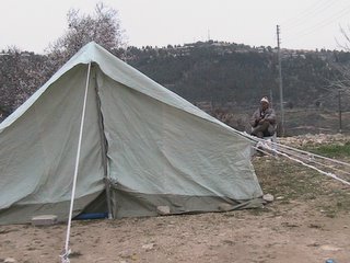 two weeks after the demolitions, people still live in tents