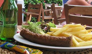 A plate of frikandel with fries