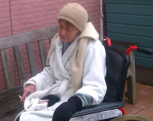 sandra in her wheelchair a few weeks before she died
