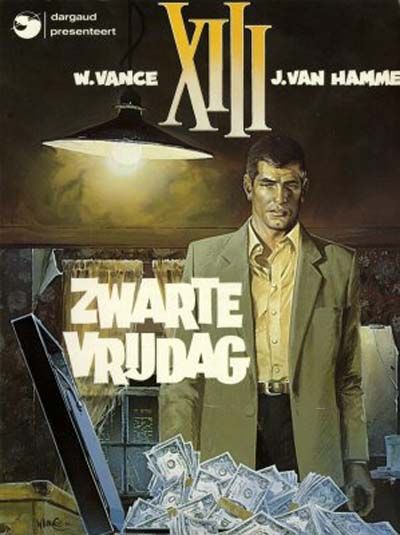 XIII, a dark haired man with a white streak on his left temple where a bullet destryed the pigment, dressed in a cheap suit, looks at an opened suitcase from which money spills out.