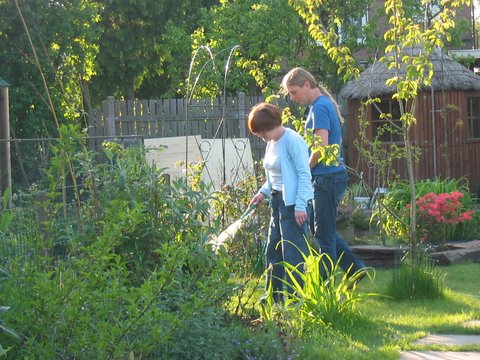 Sandra watering the garden