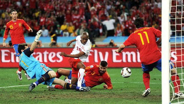 Swiss player Gelson Fernandes scores a scrappy goal against Spain