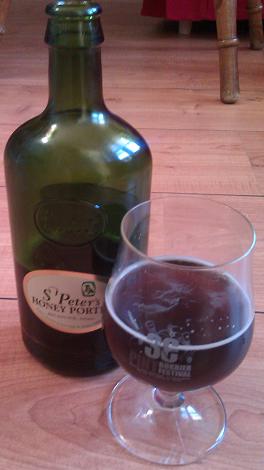 Bottle and glass of St Peters Honey Porter